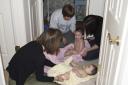 How many adults does it take to dry a toddler?