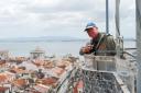 Overlooking Lisbon: Dad Atop Elevador Santa de Justa