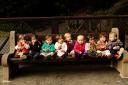 Nine Tots on a Bench